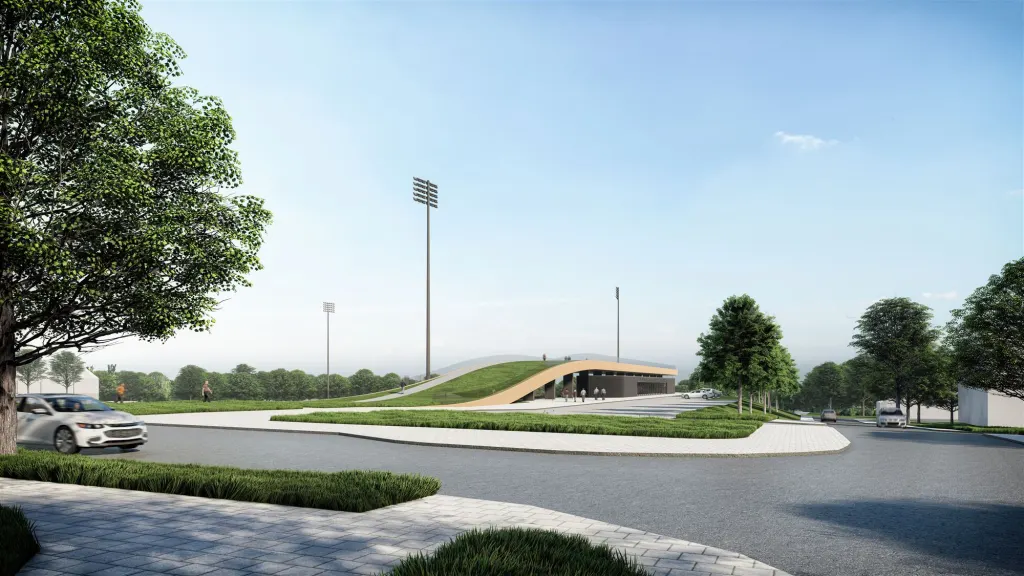 Žvėryno stadionas Vilniuje: privažiavimas prie tribūnų su žaliu stogu